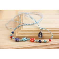 Colgante piedra azul con flor Mod1312