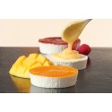 Tartaletas de queso con limón, mango y frambuesa