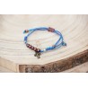 Pulsera cruz de hilo azul 42