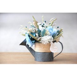 Regadera metal · Algo nuevo está brotando, ¿no lo ves?. FL130 · FLOR605